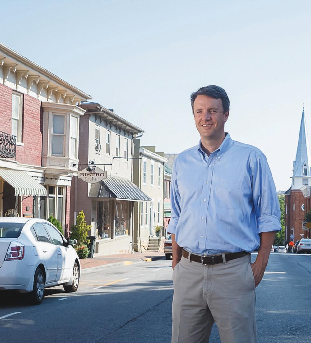 Ben Cline standing in a town street